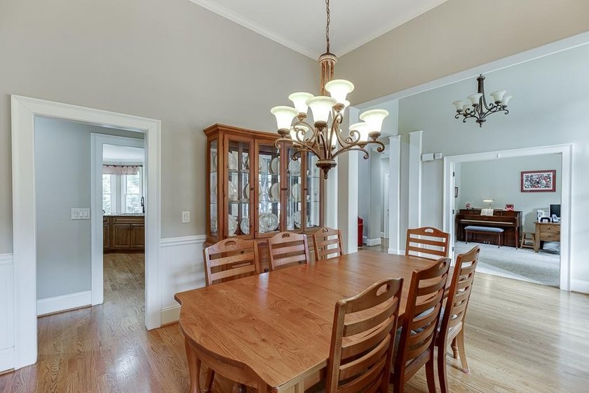 Nestled on a private one-acre homesite within the sought-after - photo 4