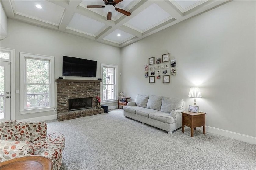 Nestled on a private one-acre homesite within the sought-after - photo 6