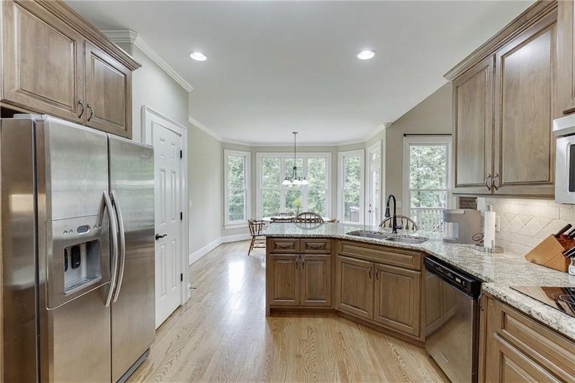 Nestled on a private one-acre homesite within the sought-after - photo 9
