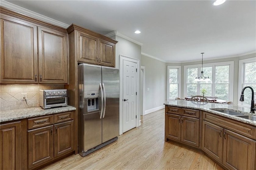 Nestled on a private one-acre homesite within the sought-after - photo 10