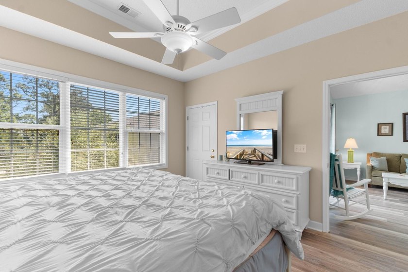 Perched on the top floor as a desirable end unit, this - photo 13