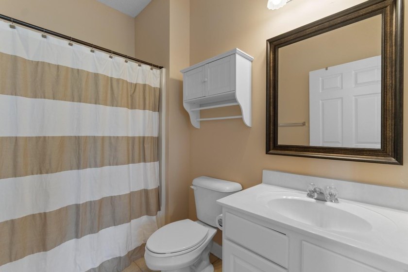 Perched on the top floor as a desirable end unit, this - photo 15