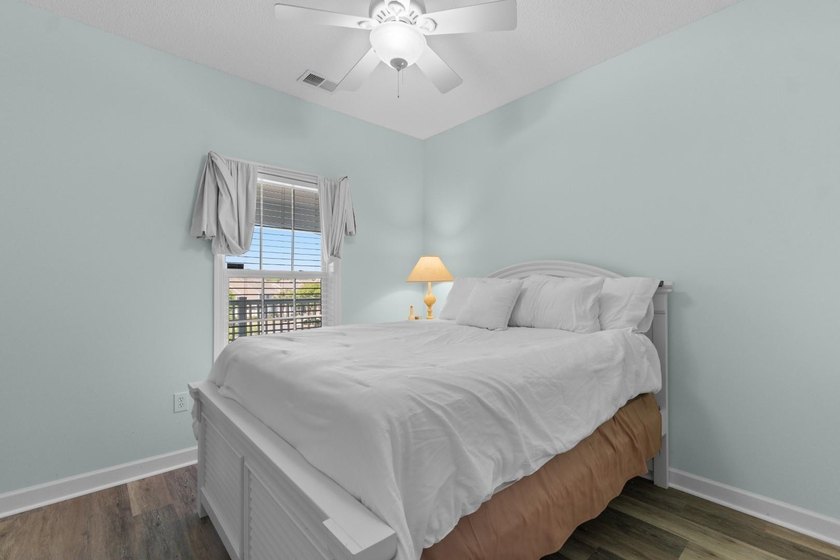 Perched on the top floor as a desirable end unit, this - photo 16