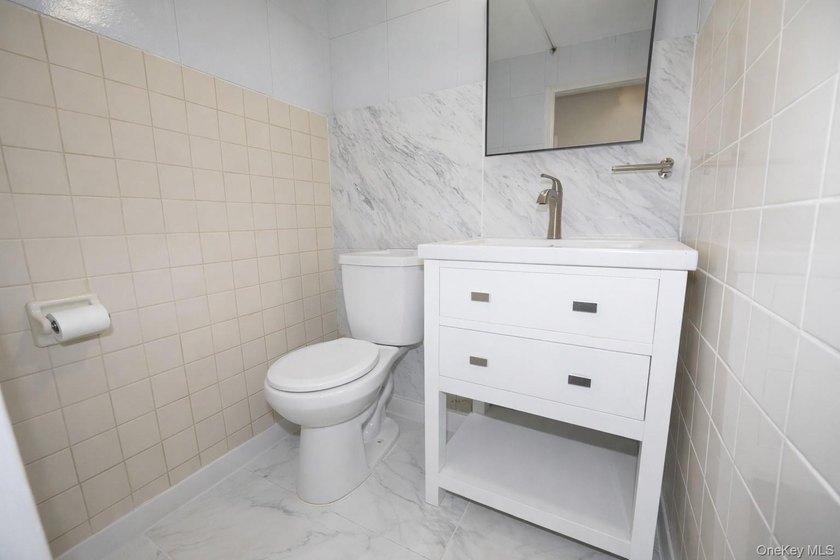 MOVE RIGHT INTO THIS WELL MAINTAINED 2 FAMILY SEMI-ATTACHED HOME - photo 30