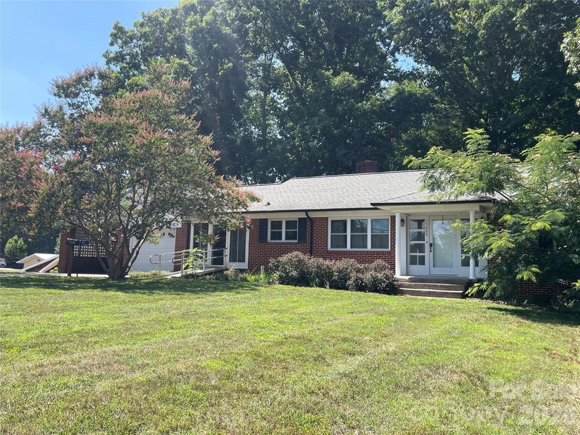 Situated on 2.93 beautiful acres, surrounded by nature. Back - photo 3