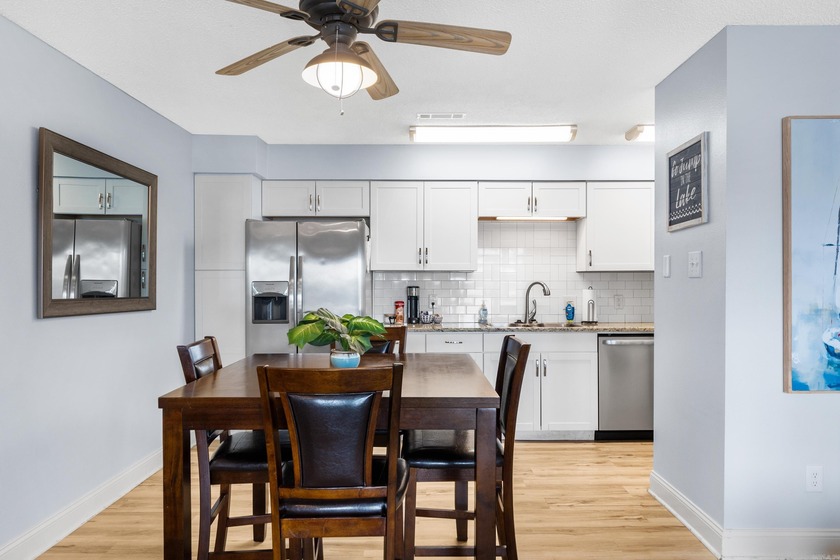 Gorgeous ground level 2 bedroom condo with NEW FLOORING and a - photo 9