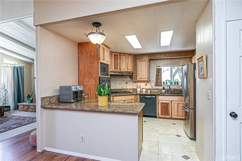 Updated &amp; Move-In Ready! This beautifully maintained 2-bedroom - photo 12