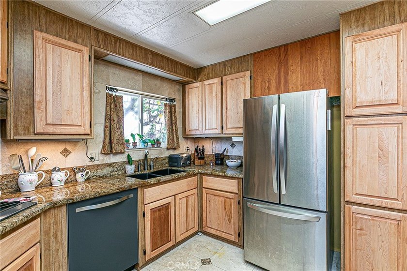 Updated &amp; Move-In Ready! This beautifully maintained 2-bedroom - photo 14