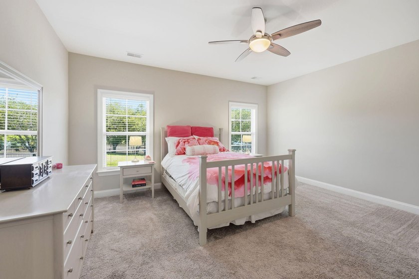 Nestled on a picturesque cul-de-sac, this exceptional, freshly - photo 17
