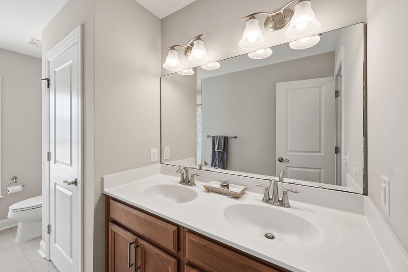 Nestled on a picturesque cul-de-sac, this exceptional, freshly - photo 32