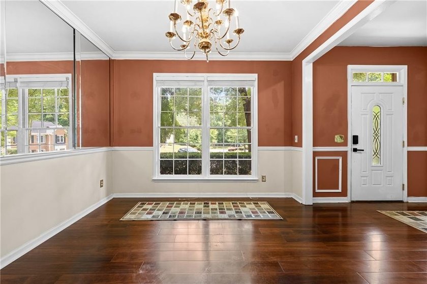 Welcome home to this beautifully maintained brick-front - photo 6