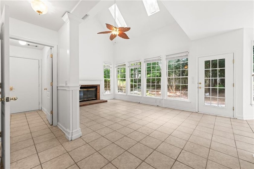 Welcome home to this beautifully maintained brick-front - photo 9
