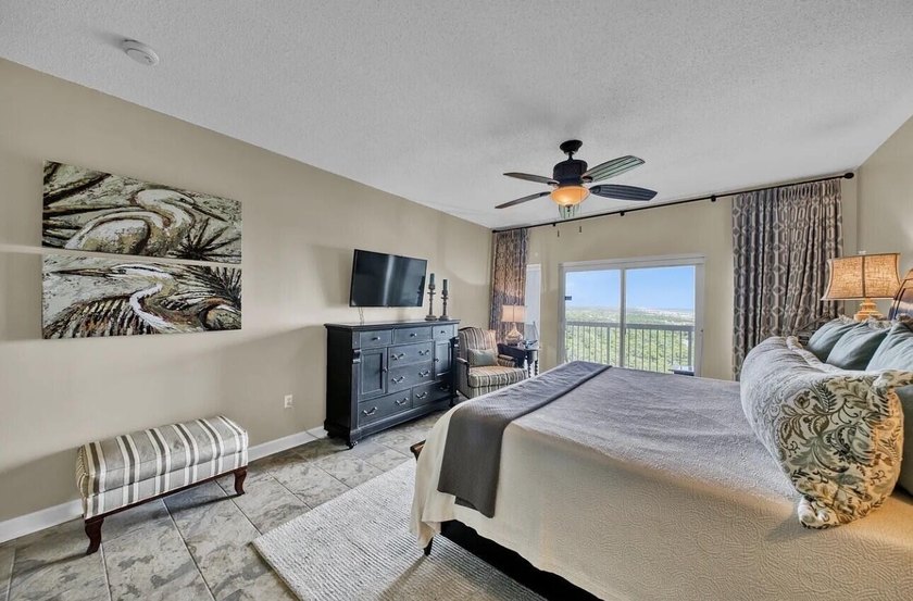 This spacious, 10th floor, open layout is one of the best on the - photo 5