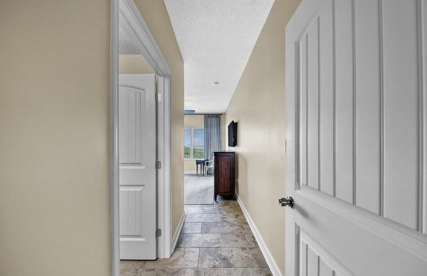 This spacious, 10th floor, open layout is one of the best on the - photo 8