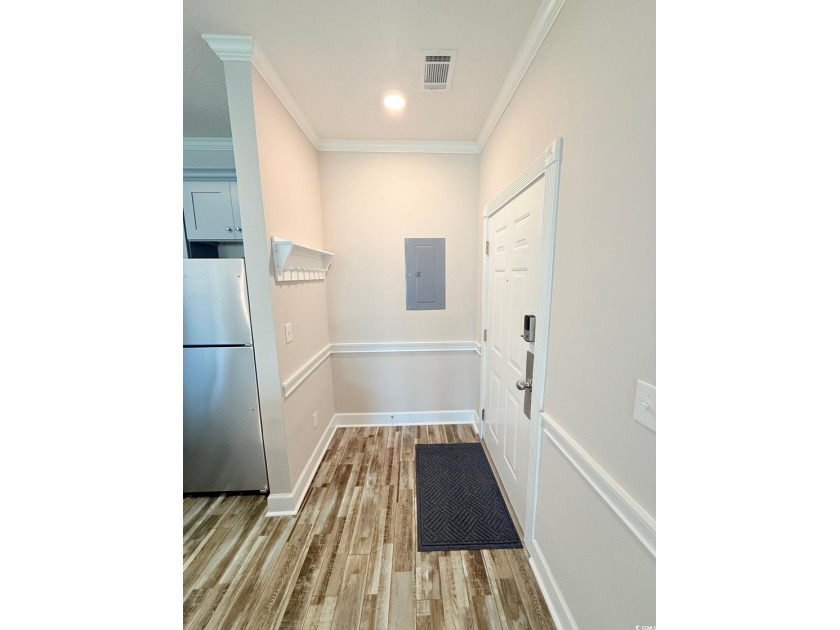 Fully Remodeled, First Floor, Corner End Unit with a Private One - photo 2