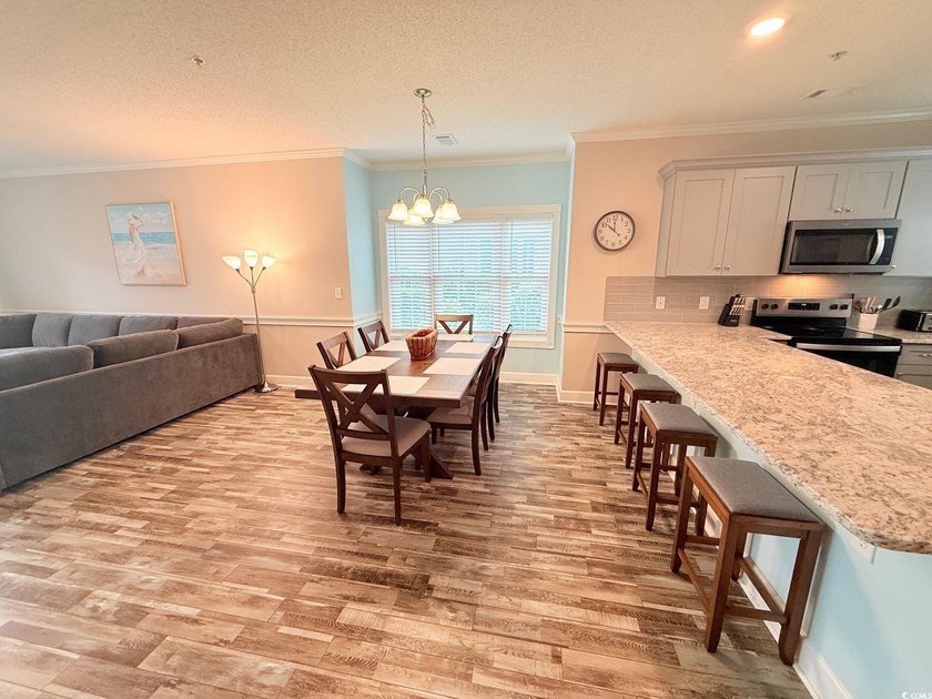 Fully Remodeled, First Floor, Corner End Unit with a Private One - photo 6