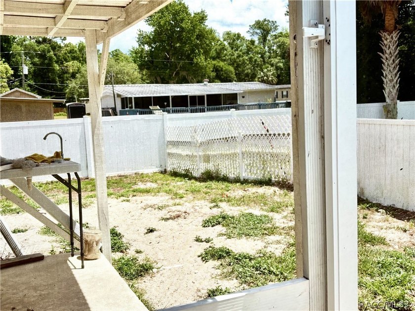 Check out this great double wide mobile on a 1.05 acre lot. It - photo 23