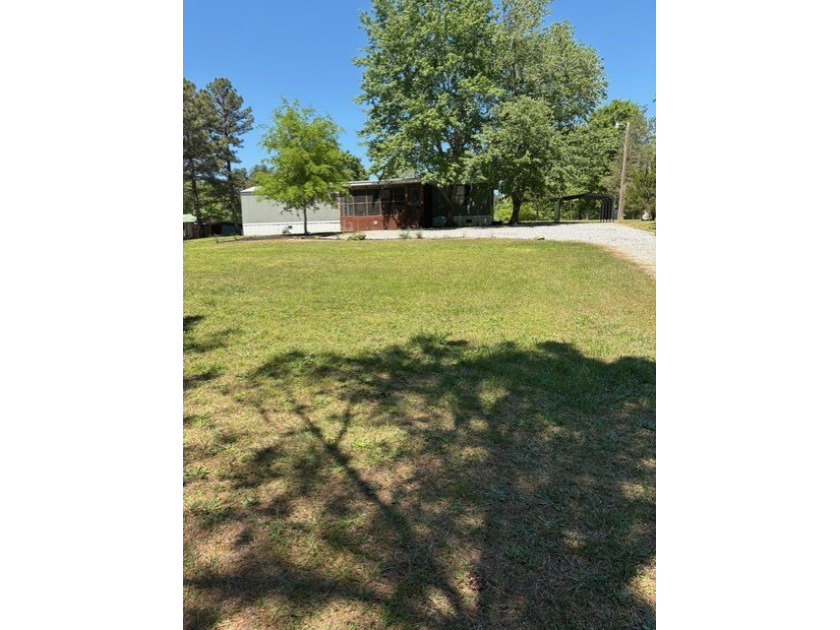 VERY NICE HOME MANY UPDATES NEW METAL ROOF 2024, NEW GRAVEL - photo 4