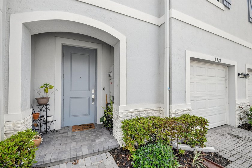 Experience modern luxury in the heart of Lake Worth! Built in - photo 3
