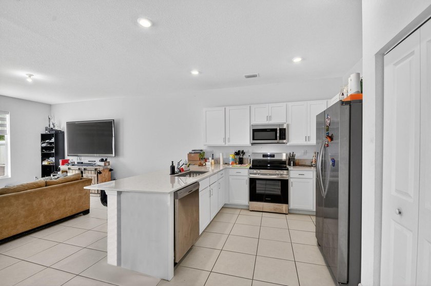 Experience modern luxury in the heart of Lake Worth! Built in - photo 7