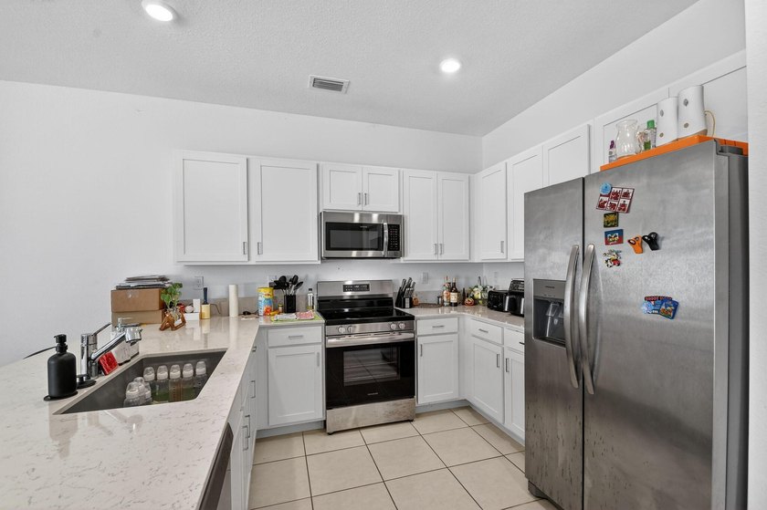 Experience modern luxury in the heart of Lake Worth! Built in - photo 8