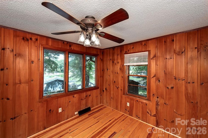 Welcome to this 4-bedroom, 3-bathroom waterfront retreat on the - photo 21