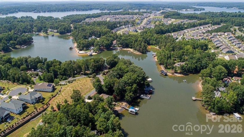 Welcome to this 4-bedroom, 3-bathroom waterfront retreat on the - photo 36