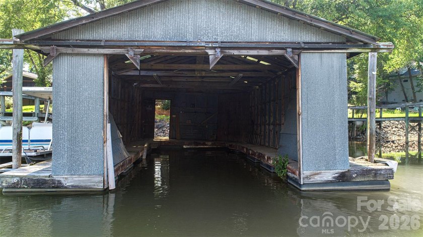 Welcome to this 4-bedroom, 3-bathroom waterfront retreat on the - photo 38