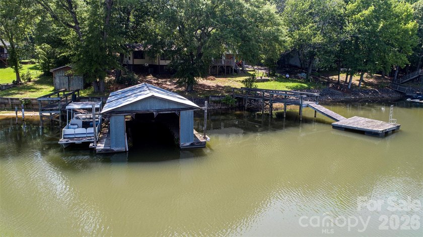 Welcome to this 4-bedroom, 3-bathroom waterfront retreat on the - photo 39