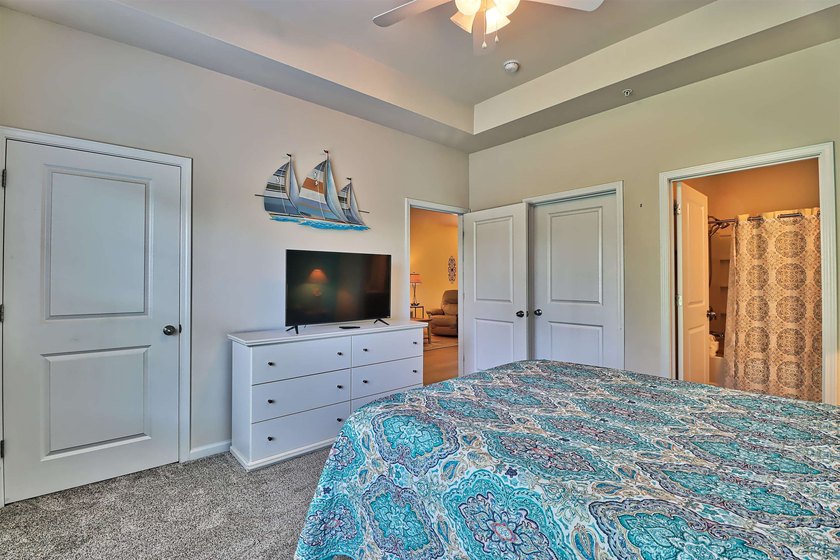 TRANSFERABLE GOLF MEMBERSHIP!! The unit is a 3-bedroom, 2 bath - photo 15