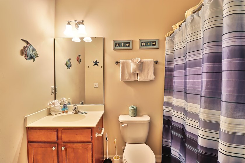 TRANSFERABLE GOLF MEMBERSHIP!! The unit is a 3-bedroom, 2 bath - photo 19