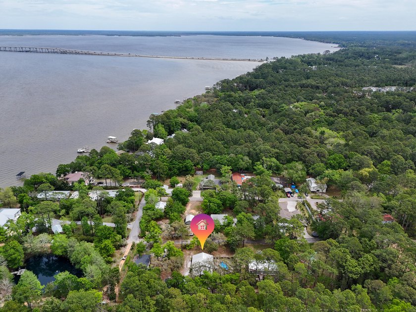 Tucked away in the heart of Santa Rosa Beach, this charming and - photo 4