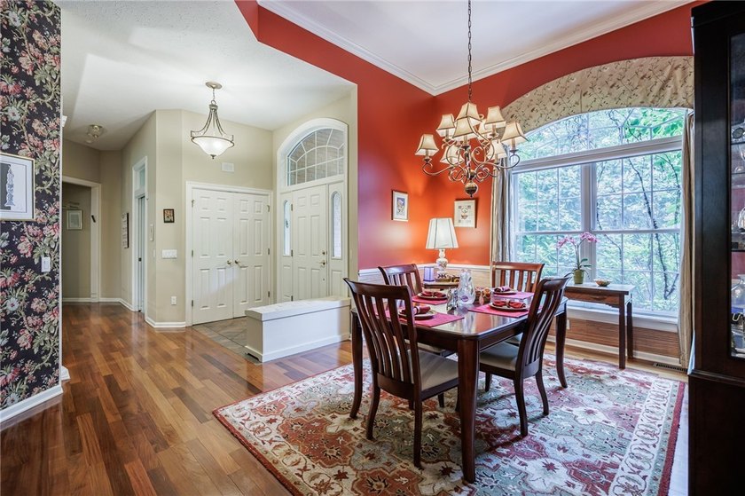 Welcome to this sprawling 2005-built ranch, privately nestled on - photo 5