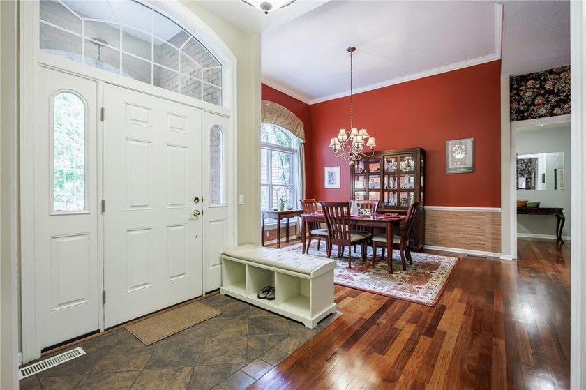 Welcome to this sprawling 2005-built ranch, privately nestled on - photo 6