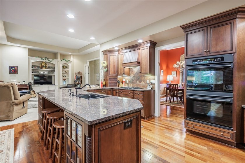 Welcome to this sprawling 2005-built ranch, privately nestled on - photo 7