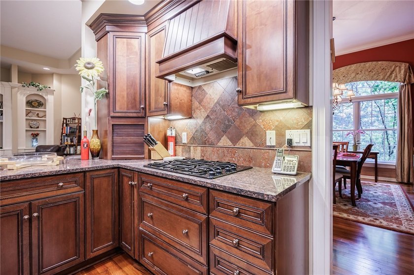 Welcome to this sprawling 2005-built ranch, privately nestled on - photo 8