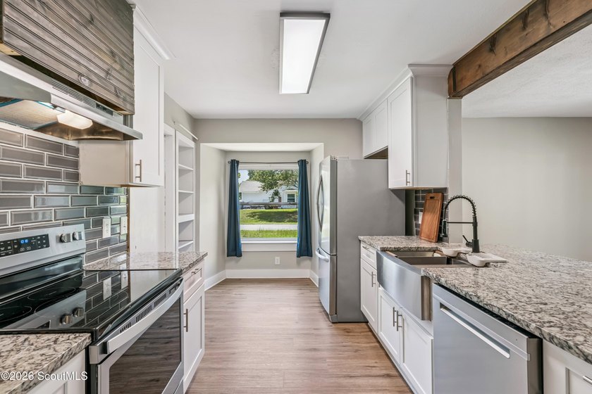Discover this beautifully updated 3 bedroom, 2 bathroom home - photo 10
