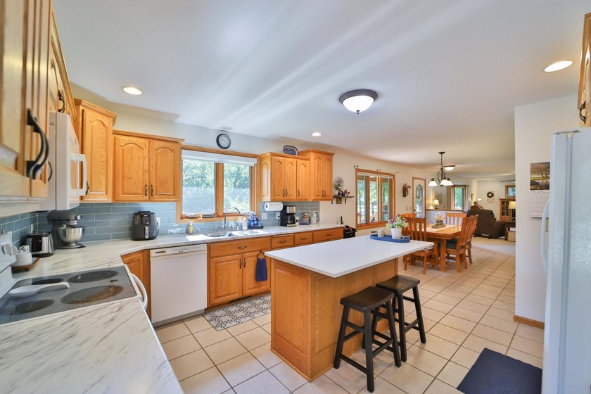 Four-bedroom, three-bathroom home with a two-stall garage - photo 4