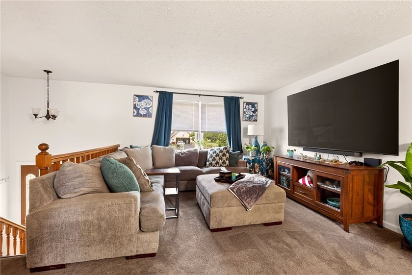 Welcome to this beautifully maintained raised ranch nestled on - photo 16