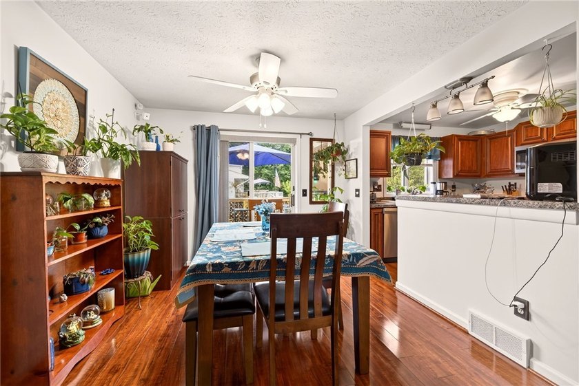 Welcome to this beautifully maintained raised ranch nestled on - photo 19