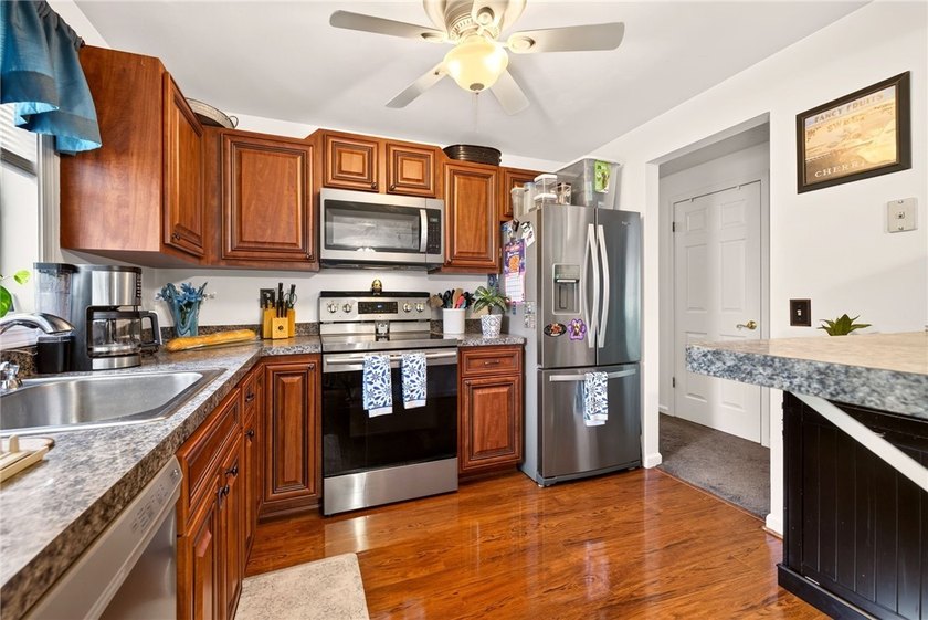 Welcome to this beautifully maintained raised ranch nestled on - photo 20