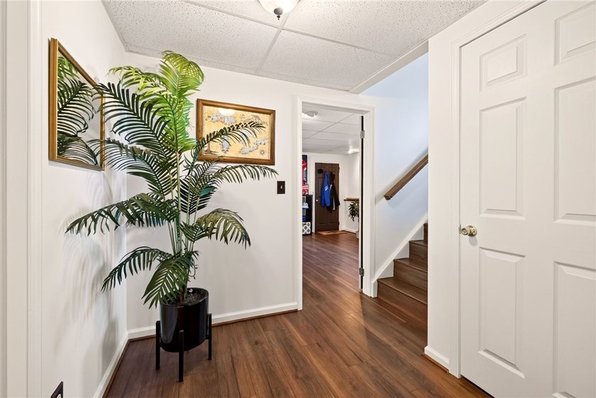 Welcome to this beautifully maintained raised ranch nestled on - photo 26
