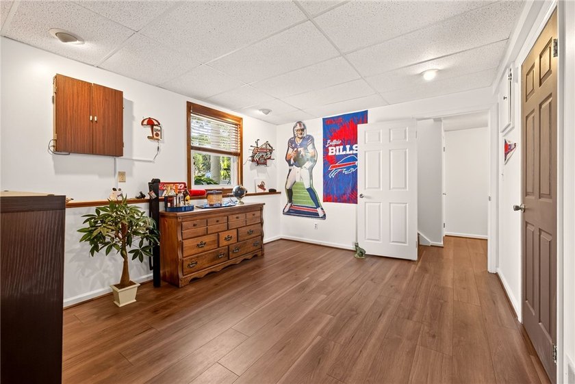 Welcome to this beautifully maintained raised ranch nestled on - photo 28