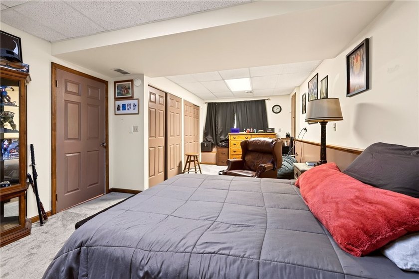 Welcome to this beautifully maintained raised ranch nestled on - photo 33