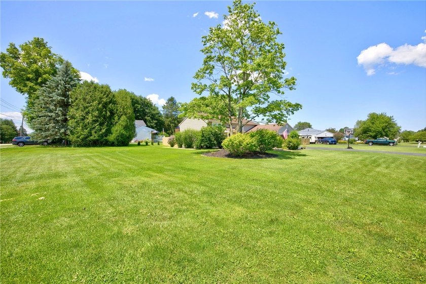 Welcome to this beautifully maintained raised ranch nestled on - photo 34