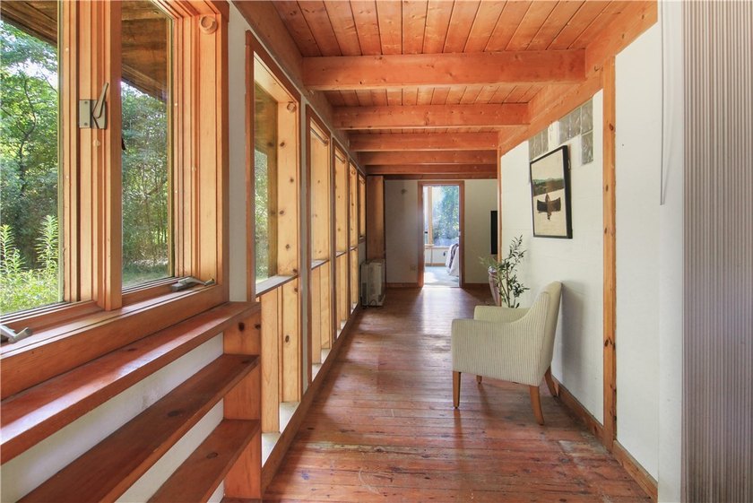 Beautiful contemporary home tucked into the woods with a creek - photo 3