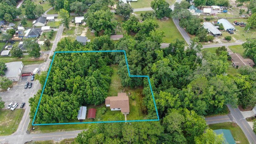 Check out this older home on almost an acre in the heart of town - photo 4