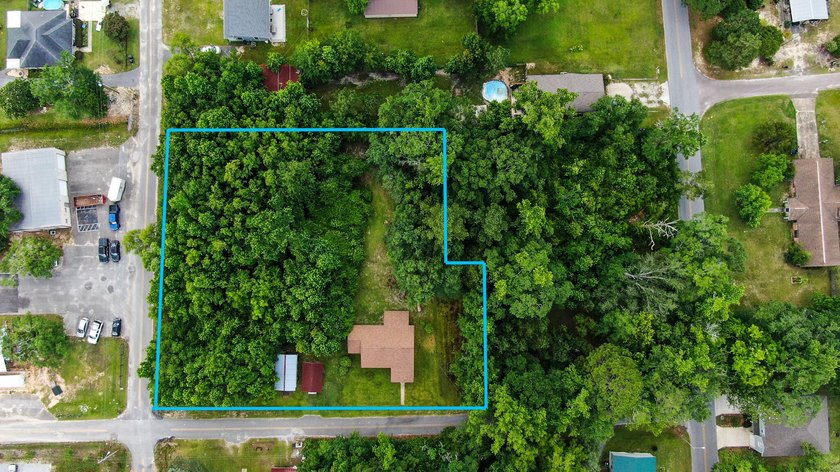 Check out this older home on almost an acre in the heart of town - photo 5