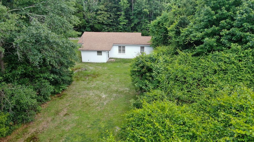 Check out this older home on almost an acre in the heart of town - photo 9