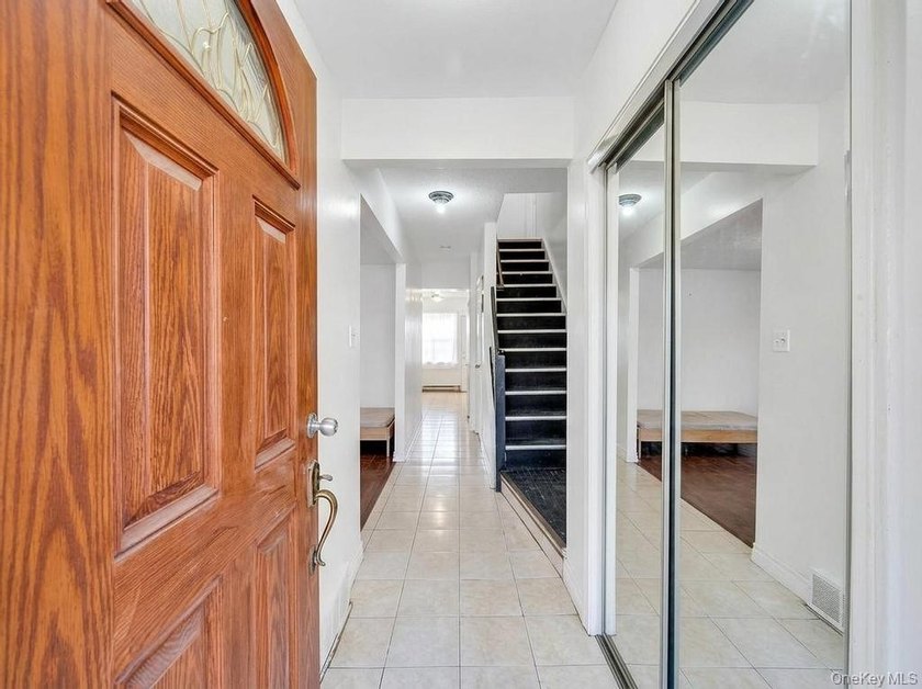 Welcome to 1128 E 84th Street, a well-maintained two-family home - photo 4